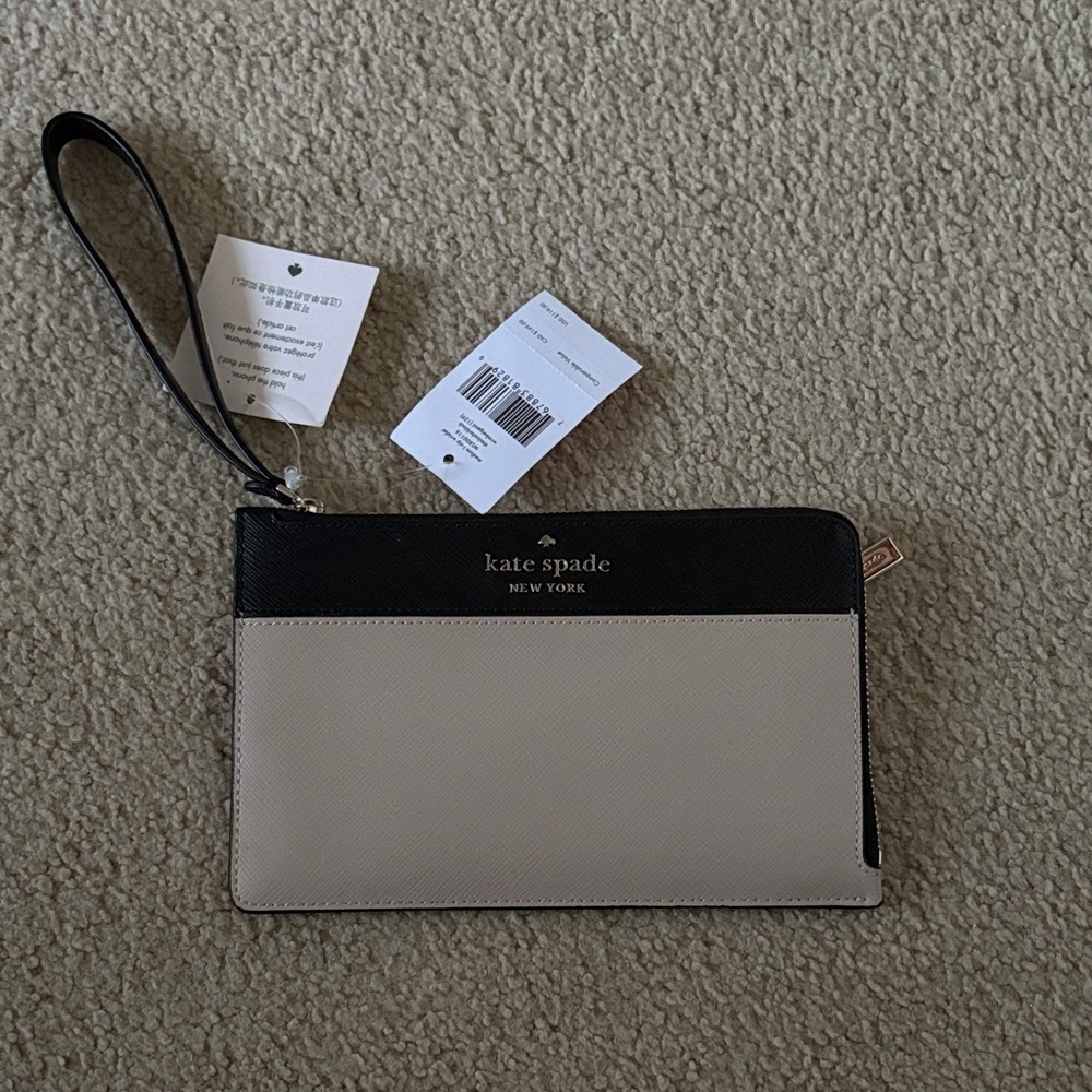 Brand new Kate Spade Black and Tan Wristlet -with tags
